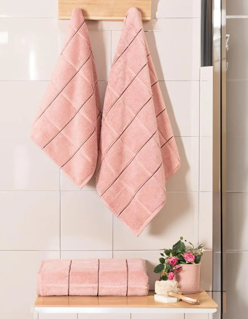 Rosa Bambus-Handtücher mit Rautenmuster im Badezimmer, waschbar & weich