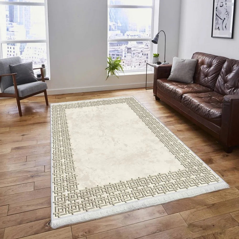 Waschbarer Teppich mit geometrischem Randmuster im Wohnzimmer, ideal für Holzböden und moderne Einrichtung