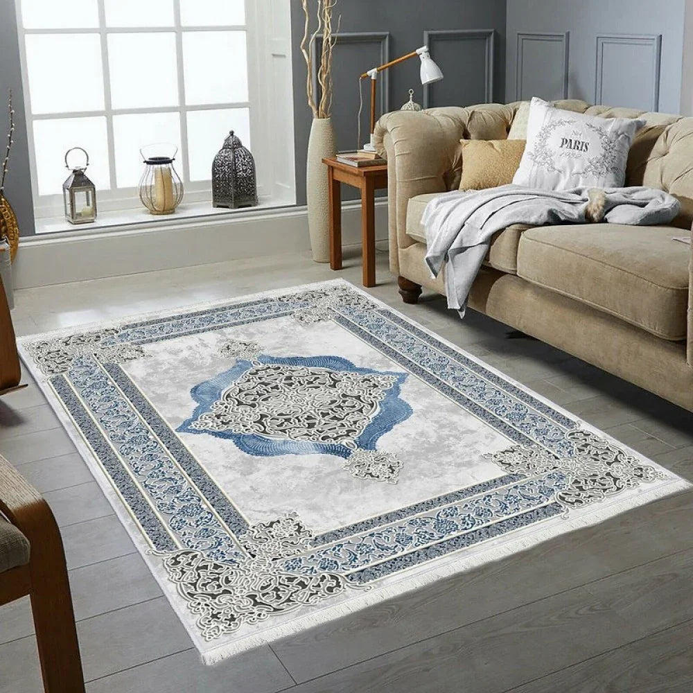 Waschbarer Teppich mit blau-weißem Ornamentmuster im Wohnzimmer, ideal für jede Waschmaschine