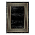 Black rectangular area rug with gold geometric border and modern distressed look