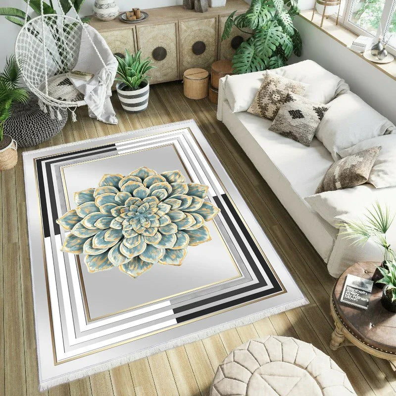 Modern living room with a large washable area rug featuring a geometric border and blue floral design